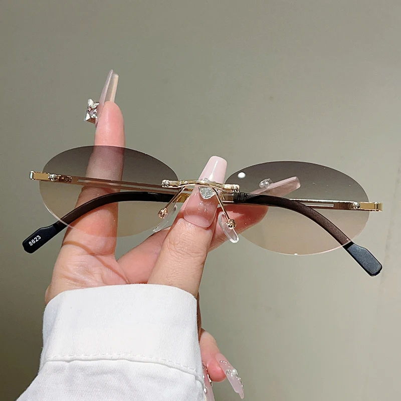 Designer Sunglasses - Randlose ovale Sonnenbrille für Damen, modische
